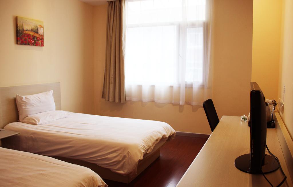Hanting Hotel Dalian Olympic Square Hotel Chambre photo
